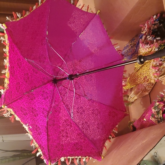20 fabric decorative umbrellas in a variety of colors. Length 24 inches. - Picture 3 of 4